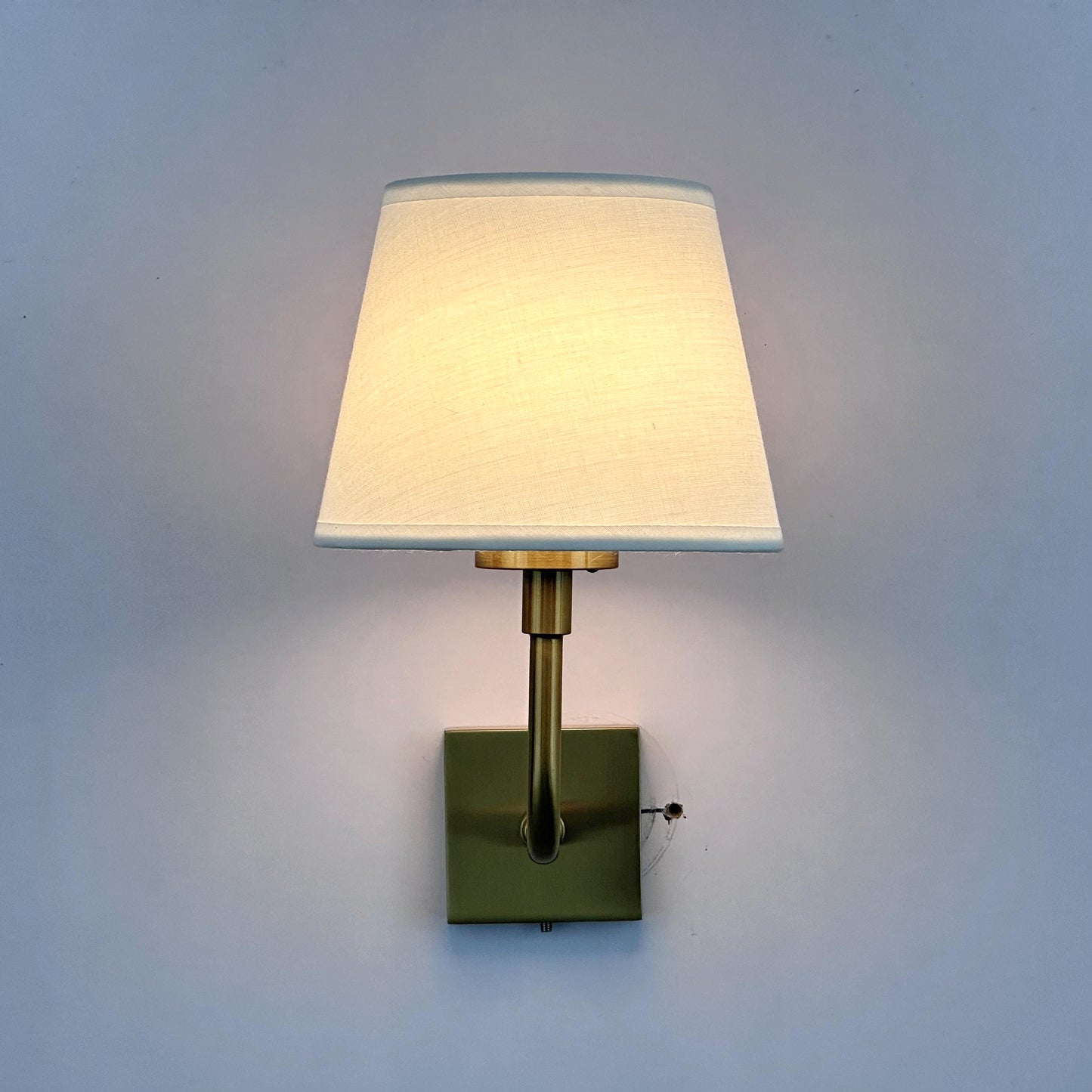 Iron wall lamp with fabric shade, gold-colored