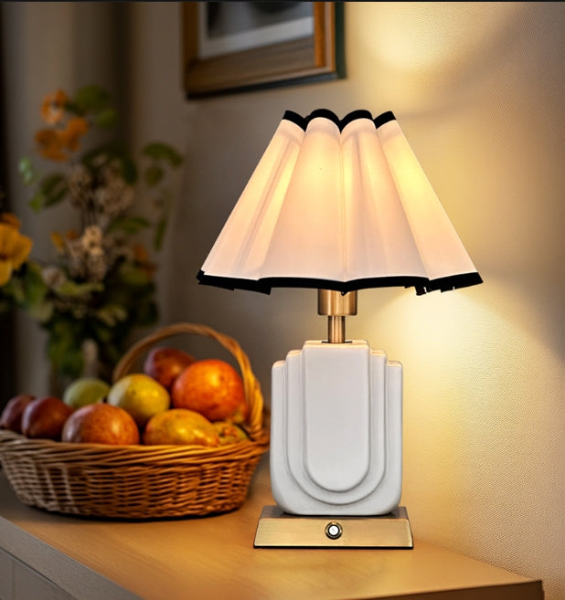 Table lamp with fabric shade and battery, gold