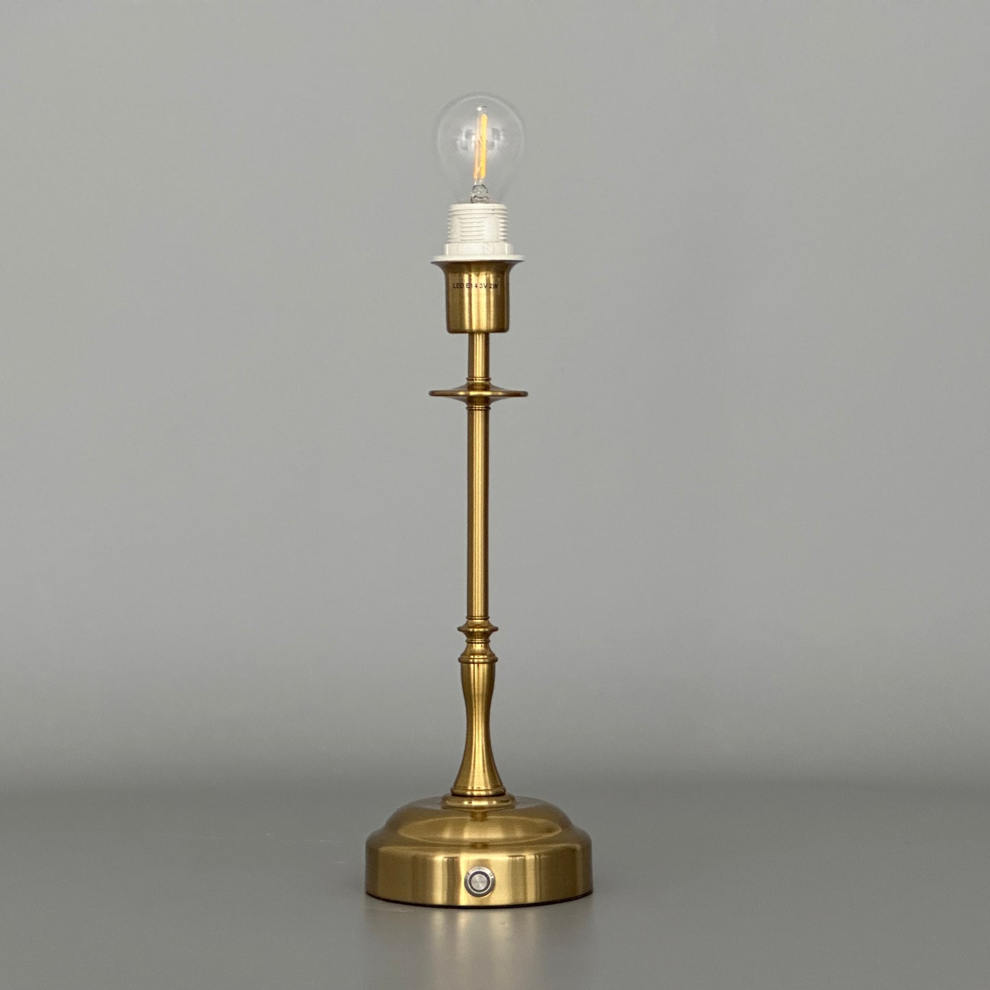 Golden table lamp with fabric shade, dimmable