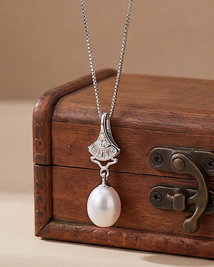 Schmuckset. Halskette und Ohrringe aus 925er Sterlingsilber mit tropfenförmigen Süßwasserperlen - TOLLzWOOD