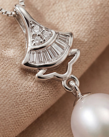 Schmuckset. Halskette und Ohrringe aus 925er Sterlingsilber mit tropfenförmigen Süßwasserperlen - TOLLzWOOD