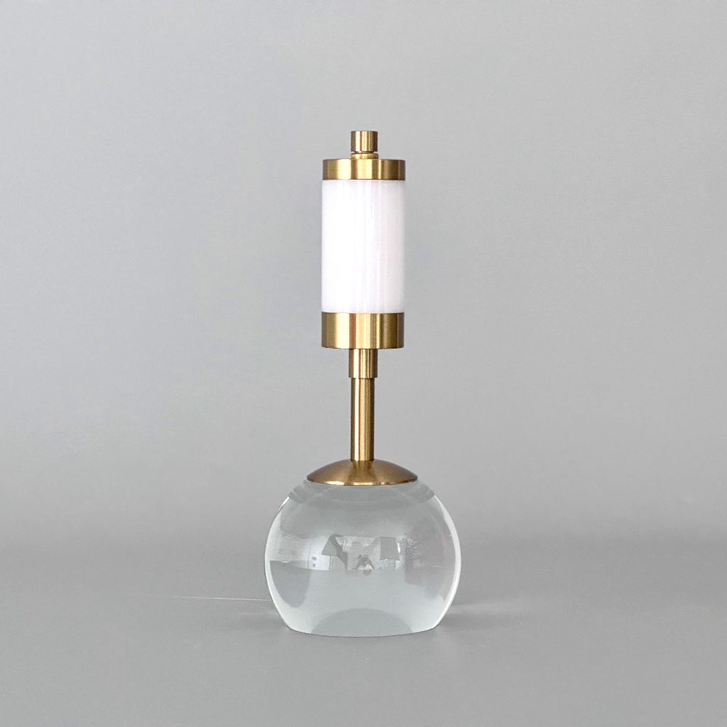 Table lamp with crystal base and fabric shade, gold-colored