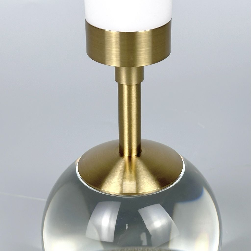 Table lamp with crystal base and fabric shade, gold-colored