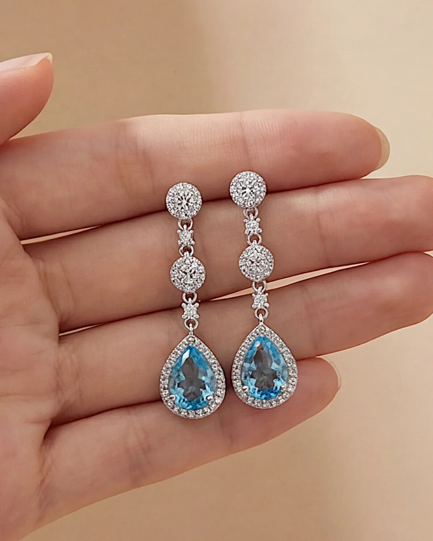Ohrringe aus 925er Silber mit blauem Zirkonia, Tropfenform - TOLLzWOOD