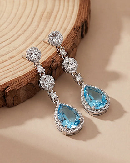Ohrringe aus 925er Silber mit blauem Zirkonia, Tropfenform - TOLLzWOOD