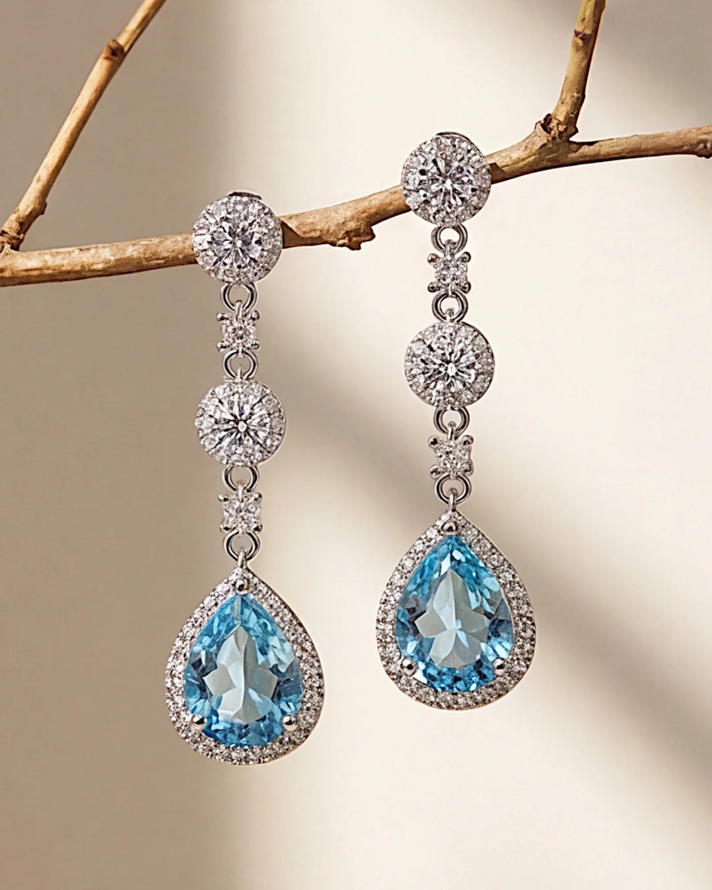 Ohrringe aus 925er Silber mit blauem Zirkonia, Tropfenform - TOLLzWOOD