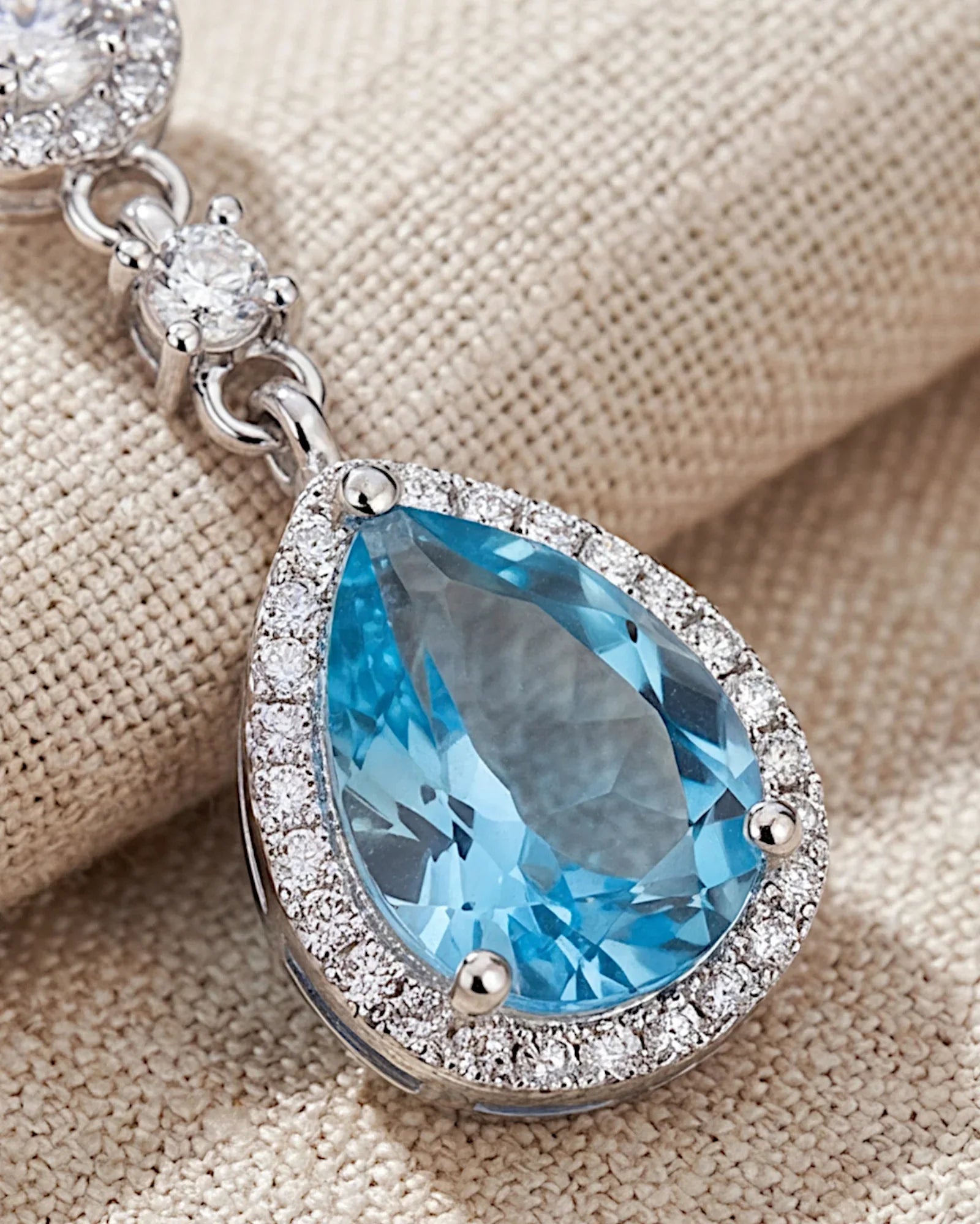 Ohrringe aus 925er Silber mit blauem Zirkonia, Tropfenform - TOLLzWOOD