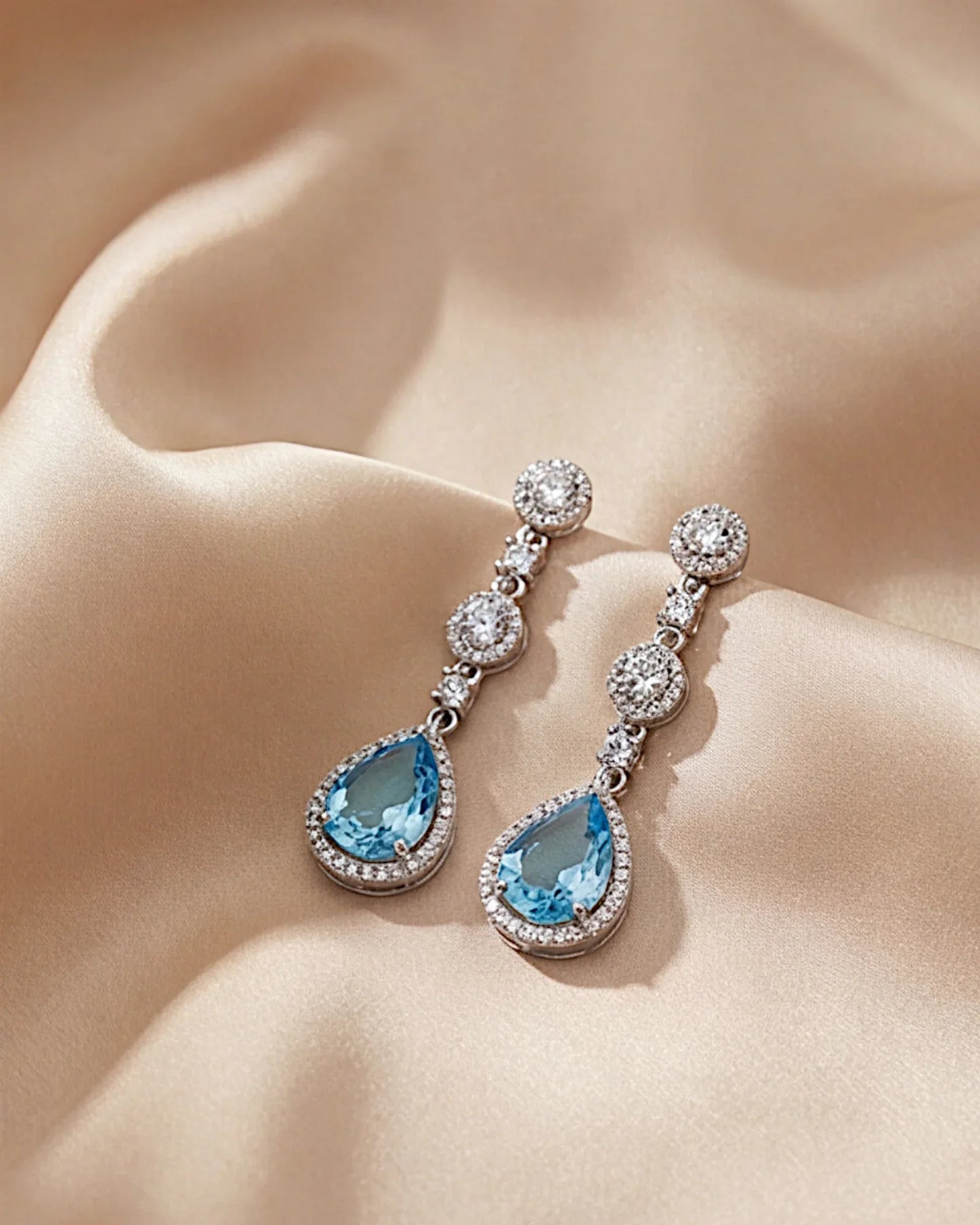 Ohrringe aus 925er Silber mit blauem Zirkonia, Tropfenform - TOLLzWOOD