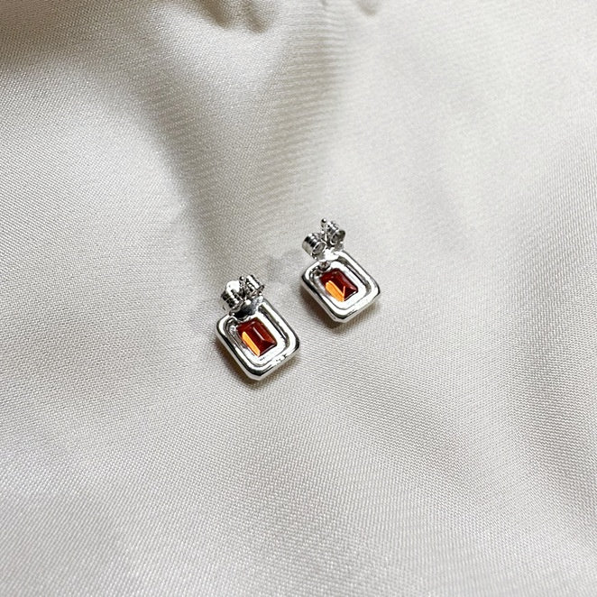 Earrings made of 925 sterling silver with red cubic zirconia